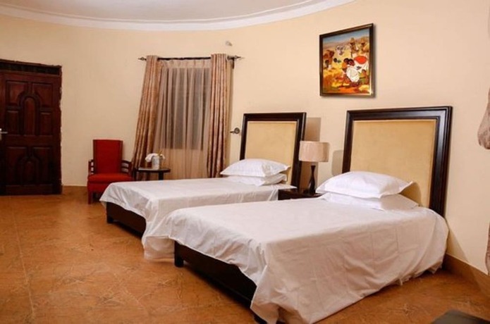 Imagen de la habitación del Hotel Nature's Green Beach Resort. Foto 25