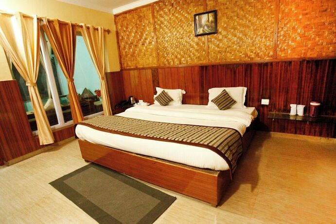 Imagen de la habitación del Hotel Nature's Valley Resort Kausani. Foto 6