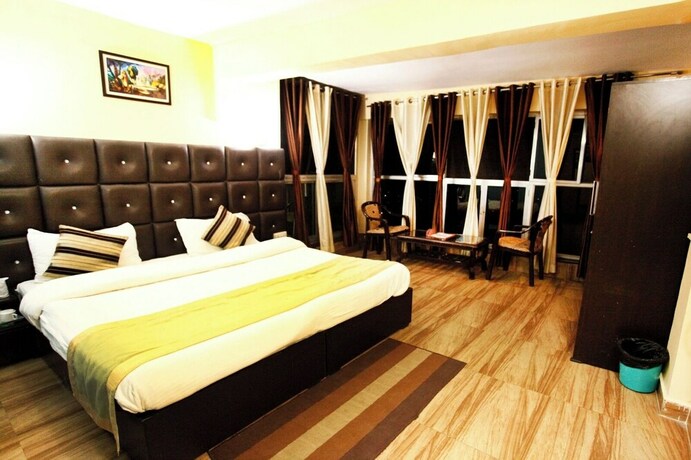 Imagen de la habitación del Hotel Nature's Valley Resort Kausani. Foto 7