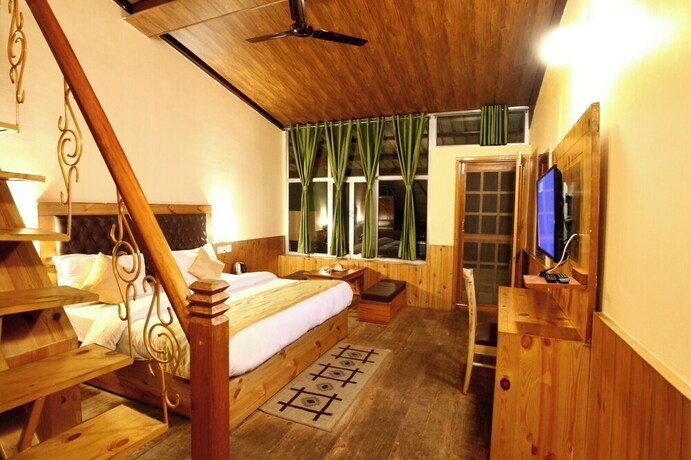 Imagen de la habitación del Hotel Nature's Valley Resort Kausani. Foto 12