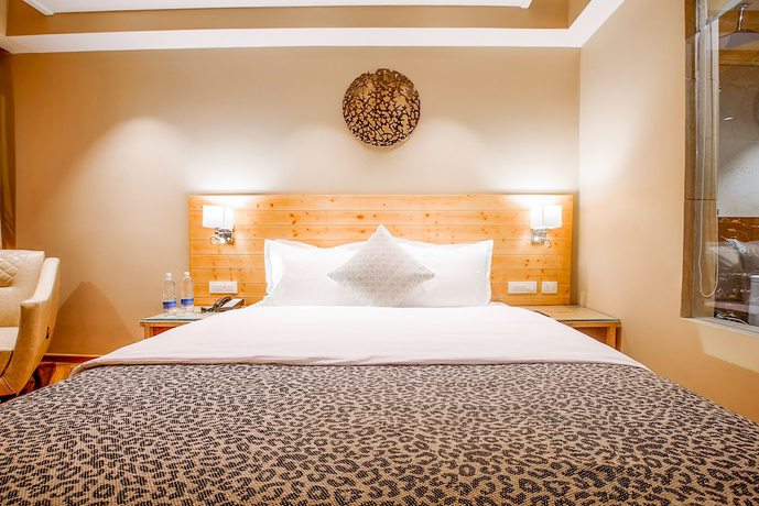 Imagen de la habitación del Hotel Naturevilas Sarovar Premiere Manali. Foto 2