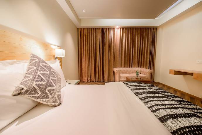 Imagen de la habitación del Hotel Naturevilas Sarovar Premiere Manali. Foto 3