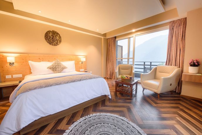 Imagen de la habitación del Hotel Naturevilas Sarovar Premiere Manali. Foto 4