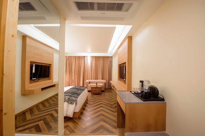 Imagen de la habitación del Hotel Naturevilas Sarovar Premiere Manali. Foto 7