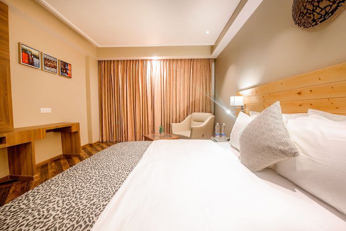Imagen de la habitación del Hotel Naturevilas Sarovar Premiere Manali. Foto 8