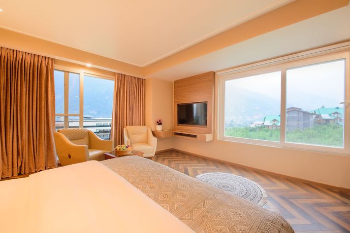 Imagen de la habitación del Hotel Naturevilas Sarovar Premiere Manali. Foto 9