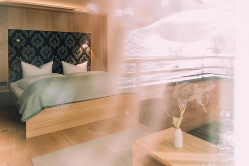 Imagen de la habitación del Hotel Naturhotel Chesa Valisa. Foto 11