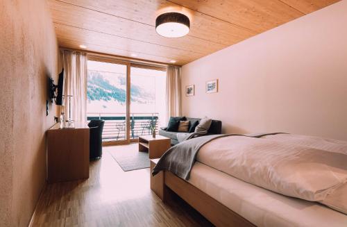 Imagen de la habitación del Hotel Naturhotel Chesa Valisa. Foto 16