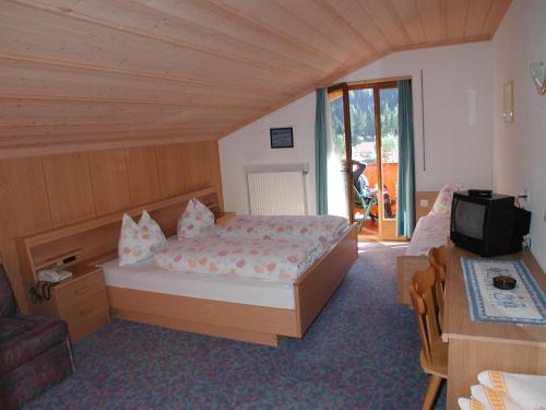 Imagen de la habitación del Hotel Naturhotel Haller. Foto 6