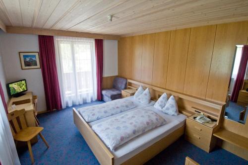 Imagen de la habitación del Hotel Naturhotel Haller. Foto 7