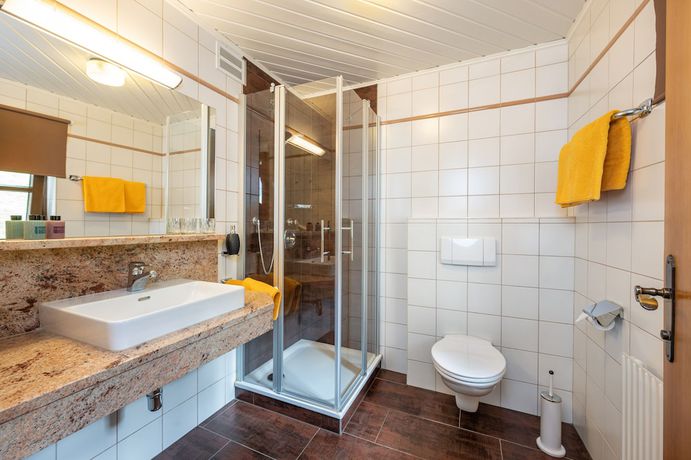 Imagen de la habitación del Hotel Naturhotel Huettenwirt. Foto 7