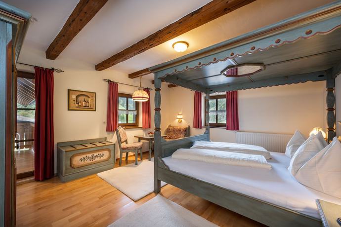 Imagen de la habitación del Hotel Naturhotel Huettenwirt. Foto 11