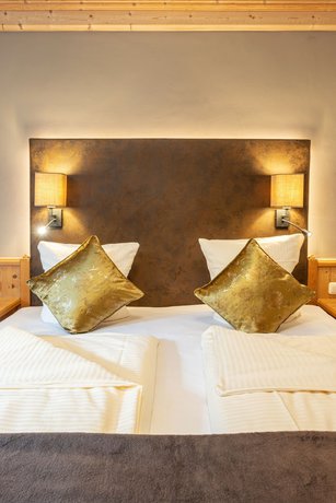 Imagen de la habitación del Hotel Naturhotel Huettenwirt. Foto 12