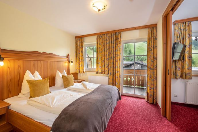 Imagen de la habitación del Hotel Naturhotel Huettenwirt. Foto 16