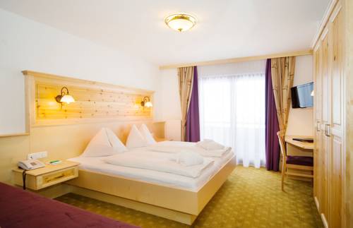 Imagen de la habitación del Hotel Naturhotel Kitzspitz. Foto 5
