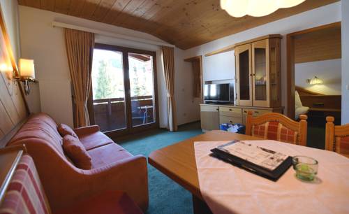 Imagen de la habitación del Hotel Naturhotel Kitzspitz. Foto 11