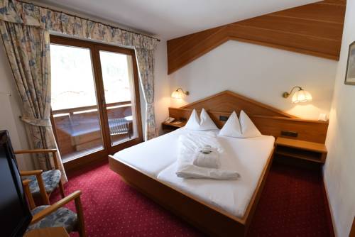 Imagen de la habitación del Hotel Naturhotel Kitzspitz. Foto 13