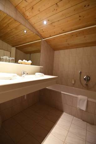 Imagen de la habitación del Hotel Naturhotel Kitzspitz. Foto 15
