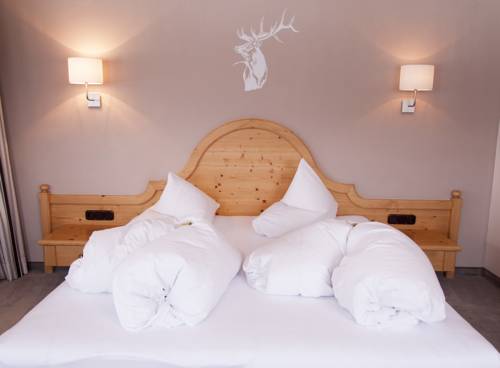 Imagen de la habitación del Hotel Naturhotel Lechlife. Foto 9