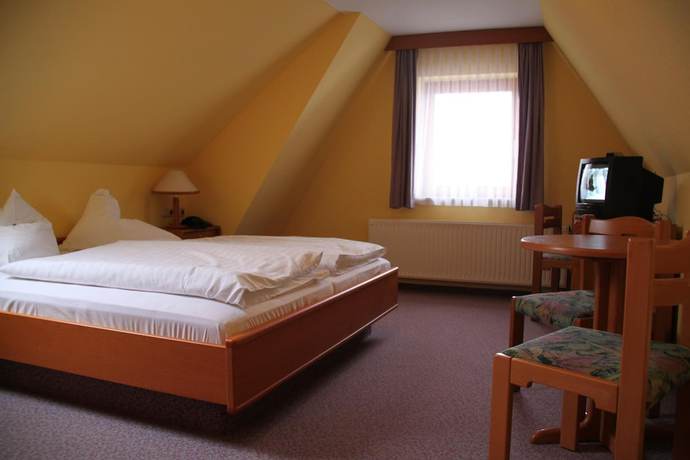 Imagen de la habitación del Hotel Naturhotel Lindenhof. Foto 13