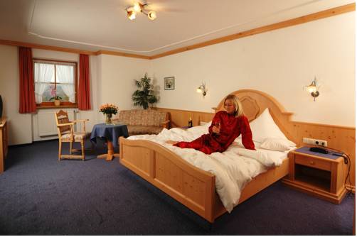 Imagen de la habitación del Hotel Naturhotel Reissenlehen. Foto 10