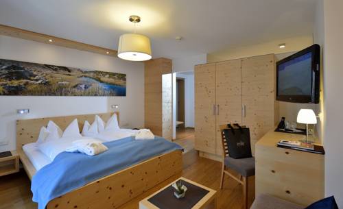 Imagen de la habitación del Hotel Naturhotel Tandler. Foto 6