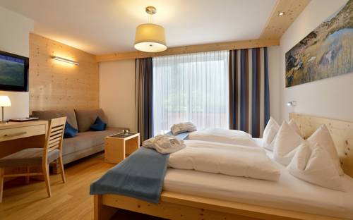 Imagen de la habitación del Hotel Naturhotel Tandler. Foto 7