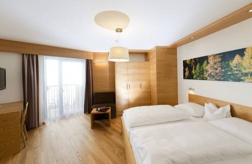 Imagen de la habitación del Hotel Naturhotel Tandler. Foto 8