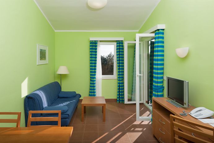 Imagen de los interiores del Hotel Naturist Park Koversada Apartments. Foto 12