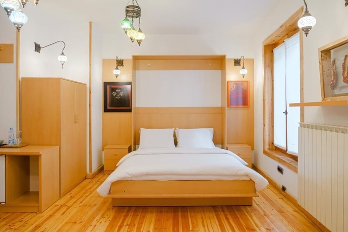 Imagen de la habitación del Hotel Natyral Razma Resort. Foto 11