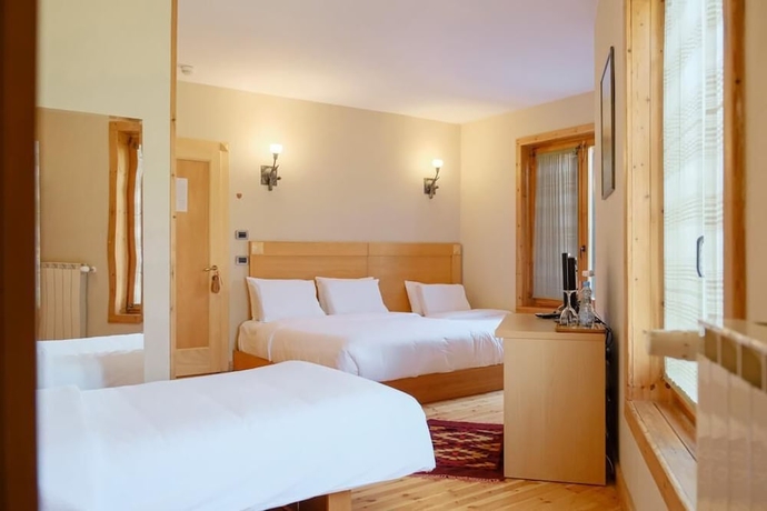 Imagen de la habitación del Hotel Natyral Razma Resort. Foto 12