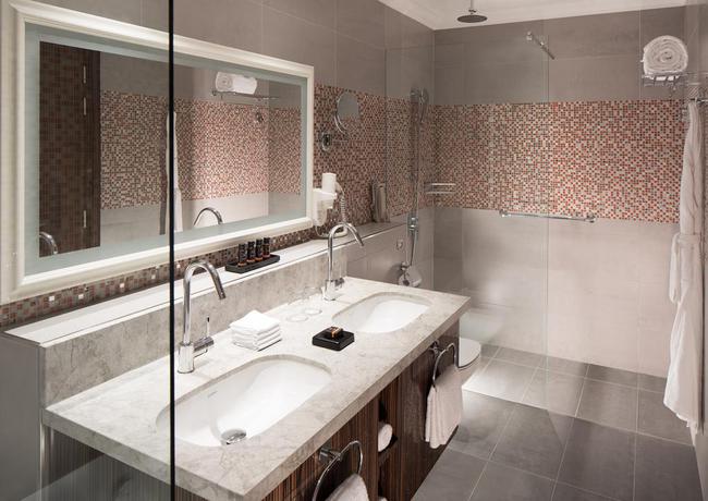 Imagen de la habitación del Hotel Naumi Dubai. Foto 14