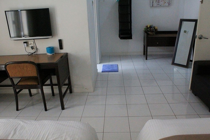 Imagen de los interiores del Hotel Nautilus Bay Home Inn. Foto 16