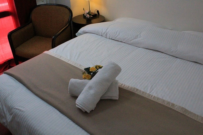 Imagen de la habitación del Hotel Nautilus Bay Home Inn. Foto 6
