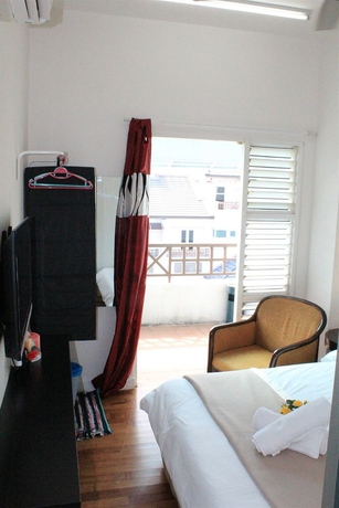 Imagen de la habitación del Hotel Nautilus Bay Home Inn. Foto 13