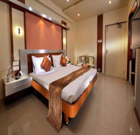 Imagen de la habitación del Hotel Navaratna Delight. Foto 4