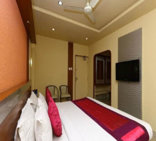 Imagen de la habitación del Hotel Navaratna Delight. Foto 6
