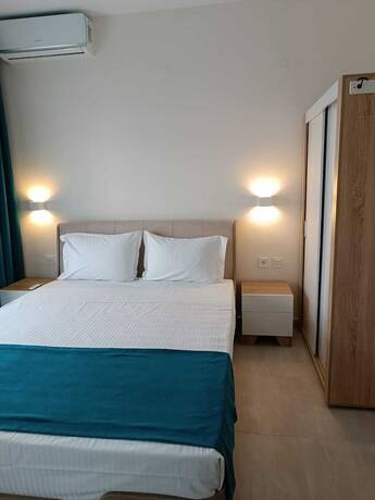 Imagen de la habitación del Hotel Navarino Luxe Suites with Sea View. Foto 13