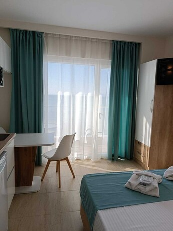 Imagen de la habitación del Hotel Navarino Luxe Suites with Sea View. Foto 19