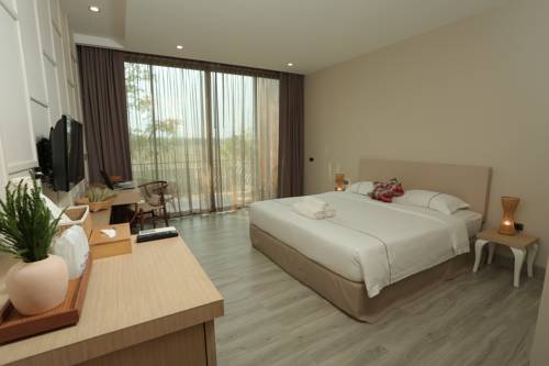Imagen de la habitación del Hotel Navela Hotel & Convention. Foto 10