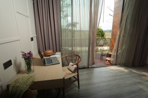 Imagen de la habitación del Hotel Navela Hotel & Convention. Foto 12