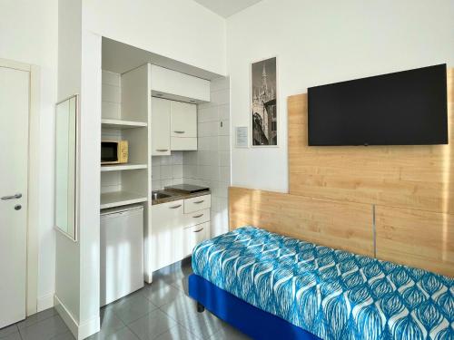 Imagen de la habitación del Hotel Navigli Suites. Foto 7