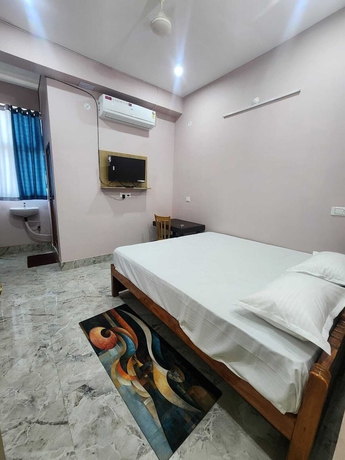 Imagen de la habitación del Hotel Navin Palace. Foto 6