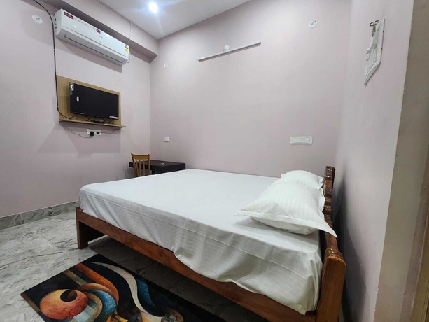 Imagen de la habitación del Hotel Navin Palace. Foto 7