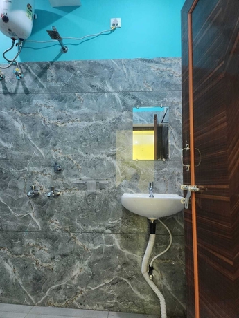 Imagen de la habitación del Hotel Navin Palace. Foto 10