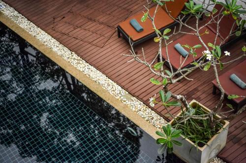 Imagen de la habitación del Hotel Navinda Krabi. Foto 11