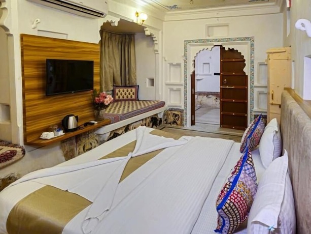 Imagen de la habitación del Hotel Navkesar Heritage. Foto 13