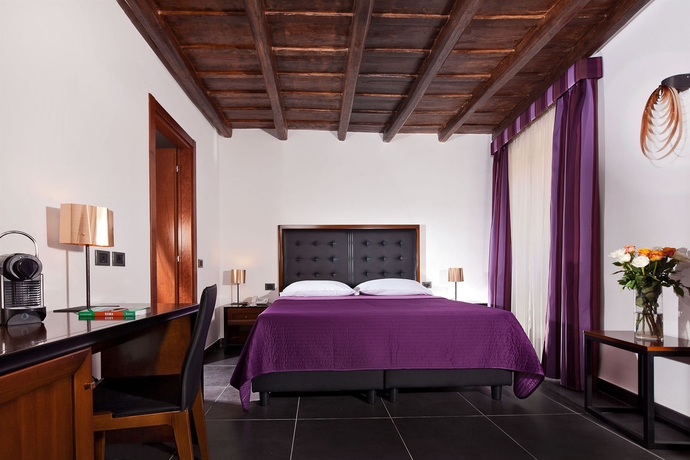 Imagen de la habitación del Hotel Navona Colors. Foto 1