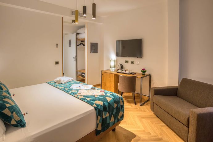 Imagen de la habitación del Hotel Navona Essence. Foto 17