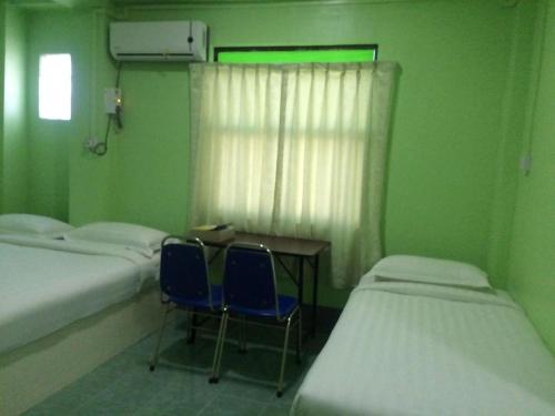 Imagen general del Hotel Nay Chi Lin. Foto 4